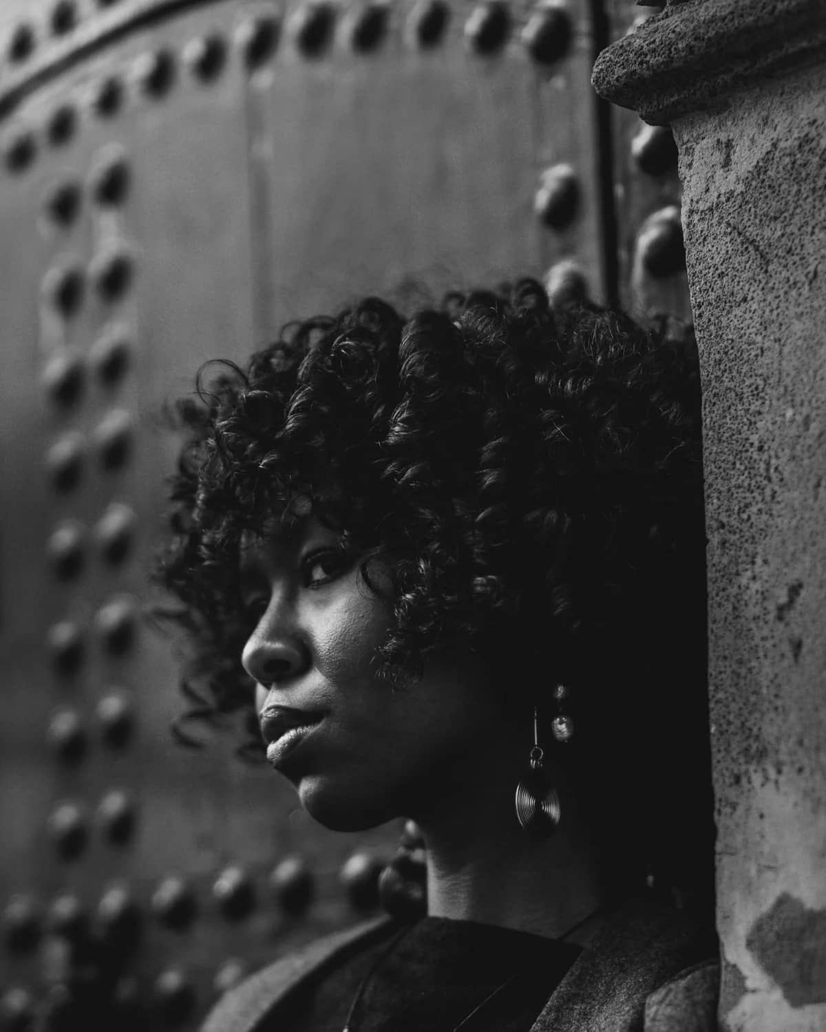Black and white editorial portrait of Marlise Wilson, Associate Producer and Project Manager. STOCK PLACEHOLDER - swap with real team portrait.